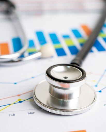 Stethoscope resting on a printed chart, illustrating a healthcare analytics case study.