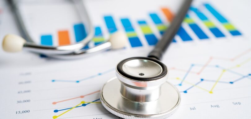 Stethoscope resting on a printed chart, illustrating a healthcare analytics case study.